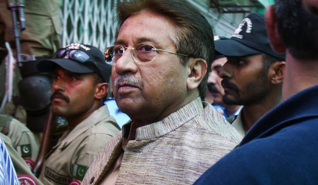 ** FILE ** Former Pakistani President Pervez Musharraf arrives at an anti-terrorism court in Islamabad on Saturday, April 20, 2013. (AP Photo/Anjum Naveed)