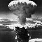 A mushroom cloud rises moments after the atomic bomb was dropped on Nagasaki, Japan, Aug. 9, 1945.