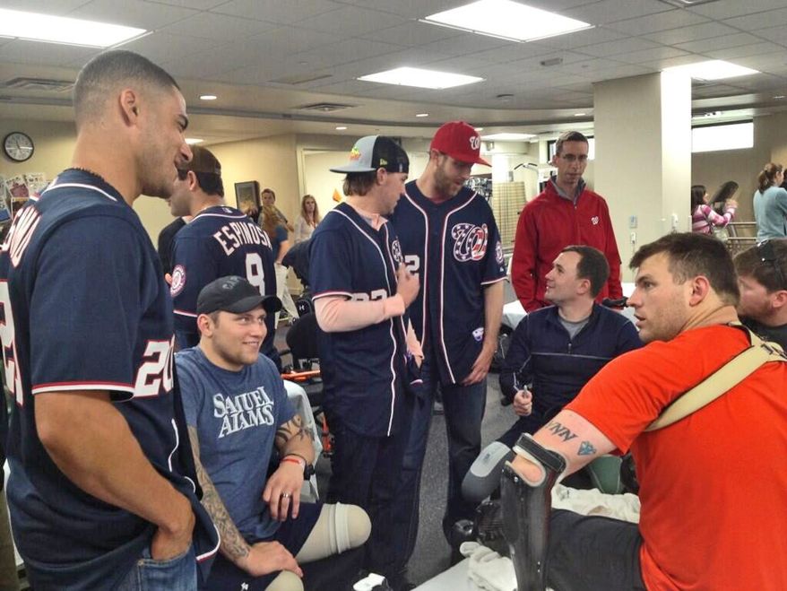 Washington Nationals players visit with military personnel rehabilitating at Walter Reed Medical Center. Photo/@nationals