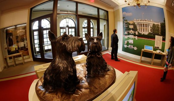 Busts of presidential pets Barney and Miss Beazley are also on display.