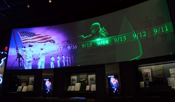  In this photo taken April 16, 2013, a large screen displays images and video of the events and days that followed the 9/11 terrorist attacks as part of an exhibit in the museum area at the George W. Bush Presidential Library and Museum in Dallas.  The museum uses everything from news clips to interactive screens to artifacts to tell the story of Bush&amp;#195;&amp;#173;s eight years in office. The George W. Bush Presidential Center, which includes the library and museum along with 43rd president&amp;#195;&amp;#173;s policy institute, will be dedicated Thursday on the campus of Southern Methodist University in Dallas. (AP Photo/Benny Snyder)