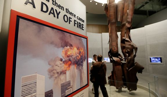 Beams damaged at New York&#39;s World Trade Center during the terrorist attacks on Sept. 11, 2001 are seen on display during a tour of the George W. Bush Presidential Center Wednesday, April 24, 2013, in Dallas. (AP Photo/David J. Phillip) 