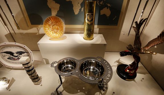 An ornate dog dish is among gifts given to President George W. Bush that are seen on display during a tour of the George W. Bush Presidential Center Wednesday, April 24, 2013, in Dallas. (AP Photo/David J. Phillip) 