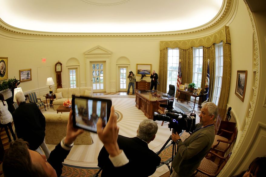 A replica of the Oval Office is seen during a tour of the George W. Bush Presidential Center Wednesday, April 24, 2013, in Dallas. More than 8,000 people are expected to attend the invitation-only dedication of the center, Thursday, April 25, which will house the presidential library and museum along with the 43rd presidentís policy institute. It opens to the public on May 1. (AP Photo/David J. Phillip)