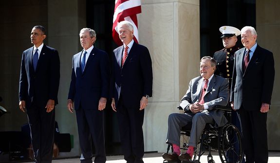 President Barack Obama stands with, from second from left, former Presidents George W. Bush, Bill Clinton, George H.W. Bush, and Jimmy Carter at the dedication of the George W. Bush presidential library on the campus of Southern Methodist University in Dallas, Thursday, April 25, 2013. (AP Photo/Charles Dharapak)