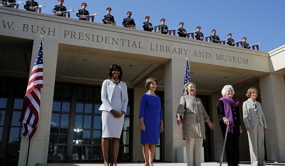 From left, First Lady Michelle Obama, former first lady Laura Bush, former first lady Hillary Clinton, former first lady Barbara Bush, former first lady Rosalynn Carter arrive for the dedication of the George W. Bush Presidential Center Thursday, April 25, 2013, in Dallas. (AP Photo/David J. Phillip) 