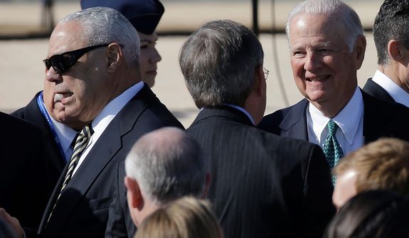 Former Secretary of State and retired four-star general Colin Powell, left, and former Secretary of State James Baker arrive for the dedication of the George W. Bush Presidential Center Thursday, April 25, 2013, in Dallas. (AP Photo/David J. Phillip) 