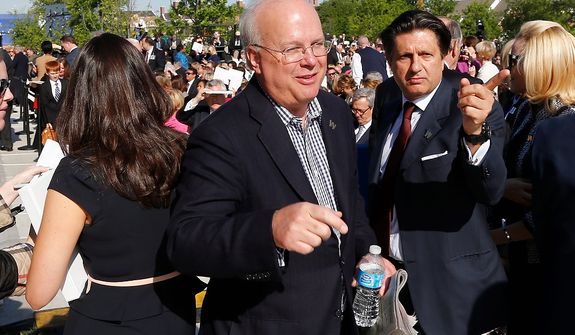 Republican strategist and former White House senior adviser Karl Rove arrives at the dedication of the George W. Bush presidential library on the campus of Southern Methodist University in Dallas, Thursday, April 25, 2013. (AP Photo/Charles Dharapak)
