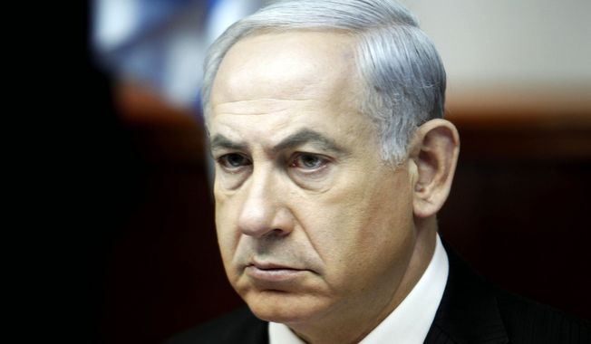 ** FILE ** Israel&#x27;s Prime Minister Benjamin Netanyahu leads the weekly cabinet meeting in Jerusalem Sunday, April 21, 2013. (AP Photo/Gali Tibbon, Pool)