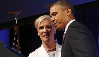 ** FILE ** President Obama is introduced by Cecile Richards, president of Planned Parenthood, before speaking at the 2013 Planned Parenthood National Conference in Washington on April 26, 2013. (Associated Press)
