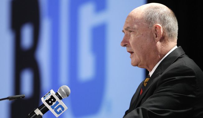 **FILE** Big Ten Commissioner Jim Delany speaks at the Big Ten football media day, Thursday, July 26, 2012, in Chicago. (AP Photo/M. Spencer Green)