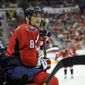Washington Capitals left wing Alex Ovechkin (8), of Russia, looks on from the bench area during the first period of an NHL hockey game against the Boston Bruins, Saturday, April 27, 2013, in Washington. (AP Photo/Nick Wass)