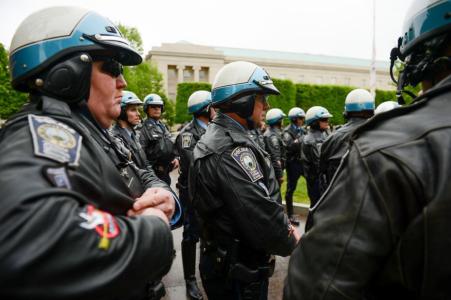 Prince Williams County motorcycle police officers arrive for a ceremony to unveil the name of slain Prince William County Police Officer Chris Yung on the wall of the National Law Enforcement Memorial, Washington, D.C., Monday, April 29, 2013. Yung was killed in a motorcycle accident while responding to a separate car crash New Years Eve last year. (Andrew Harnik/The Washington Times)
