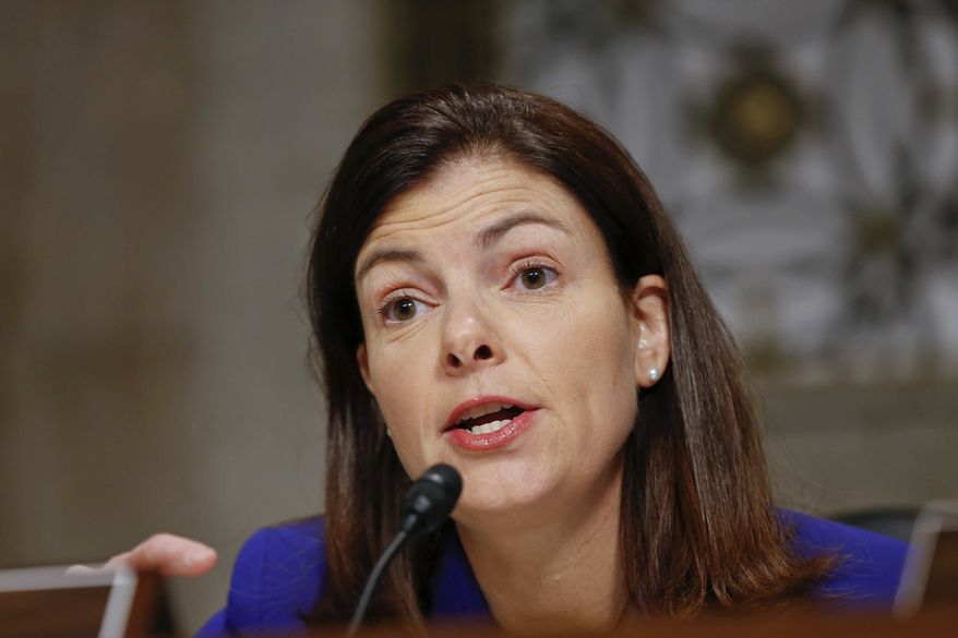 ** FILE ** Senate Armed Services Committee member Sen. Kelly Ayotte, R-N.H., questions former Nebraska Republican Sen. Chuck Hagel, President Obama's choice to lead the Pentagon, during his confirmation hearing on Capitol Hill in Washington, in this Jan. 31, 2013 file photo. A woman whose mother was killed in last year's school shooting in Newtown, Conn., confronted Ms. Ayotte Tuesday, April 30, 2013, during the senator's first public appearance in New Hampshire since voting against gun control legislation. (AP Photo/J. Scott Applewhite, File)