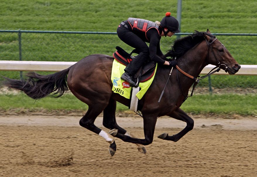 In this Monday, April 29, 2013, file photo, exercise rider Jenn Patterson rides Kentucky Derby entrant Orb for a workout at Churchill Downs in Louisville, Ky. Orb has been made the early 7-2 favorite for the Kentucky Derby on Wednesday, May 1, 2013, with undefeated Verrazano the second choice in a full field of 20 horses. (AP Photo/Garry Jones, File)