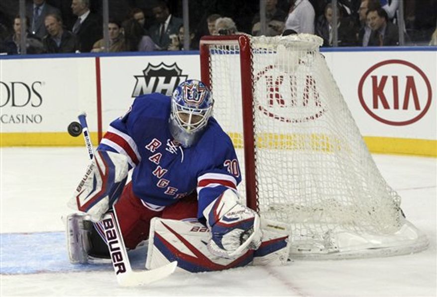 New York Rangers goalie Henrik Lundqvist, of Sweden, catches the puck during the first period of the NHL hockey game against the Florida Panthers, Thursday, April 18, 2013 at Madison Square Garden in New York. The Ranges won 6-1. (AP Photo/Mary Altaffer)