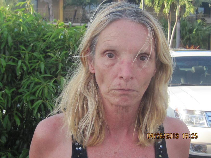 **FILE** An April 26, 2013, photo taken by the Monroe County, Fla. Sheriff's Office and released by the Lititz Borough, Pa., Police, is of Brenda Heist. Lititz Borough Police in central Pennsylvania say Heist, who disappeared after dropping off her children for school 11 years ago has been located in Florida after traveling there with homeless hitchhikers and sleeping under bridges. (Associated Press/Lititz Borough Police)