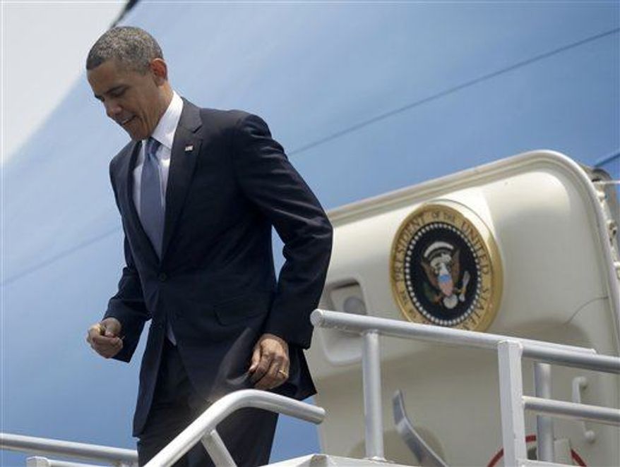 President Obama leaves Air Force One upon his arrival at Benito Juarez International Airport in Mexico City, Thursday, May 2, 2013. (AP Photo/Pablo Martinez Monsivais)