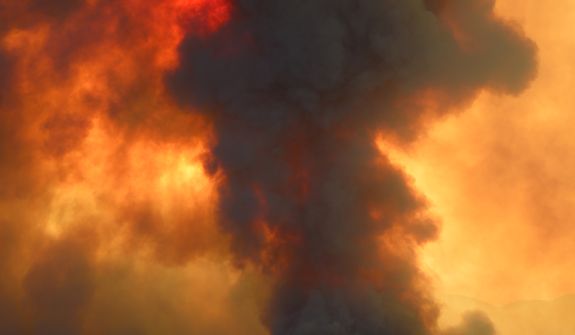 Smoke billows from a fire burring in Point Mugu State Park during a wildfire that burned several thousand acres, Thursday, May 2, 2013, in Ventura County, Calif.   (AP Photo/Mark J. Terrill)