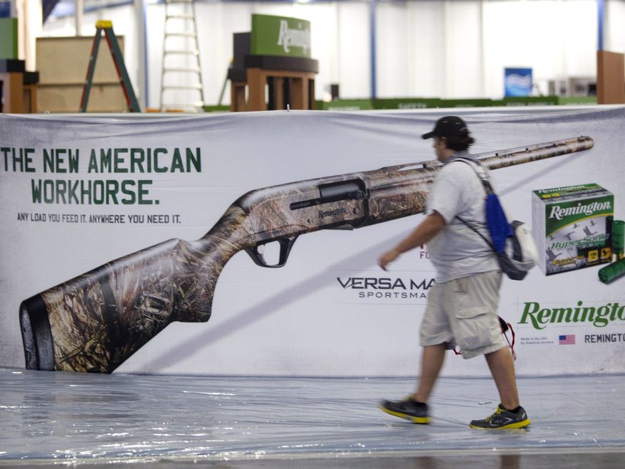 Exhibitors began setting up in preparation The National Rifle Association Annual Meetings on Wednesday, May 1, 2013, in Houston. The 2013 NRA Annual Meetings and Exhibits is scheduled to being Friday. (AP Photo/Houston Chronicle, Johnny Hanson)