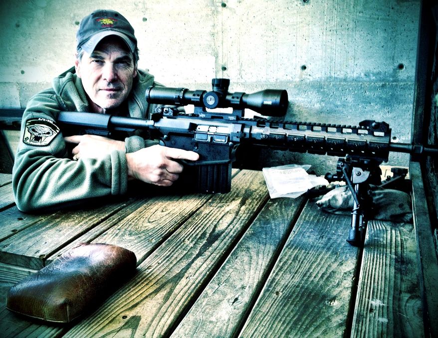 Texas Gov. Rick Perry with a LaRue Tactical AR-type rifle.