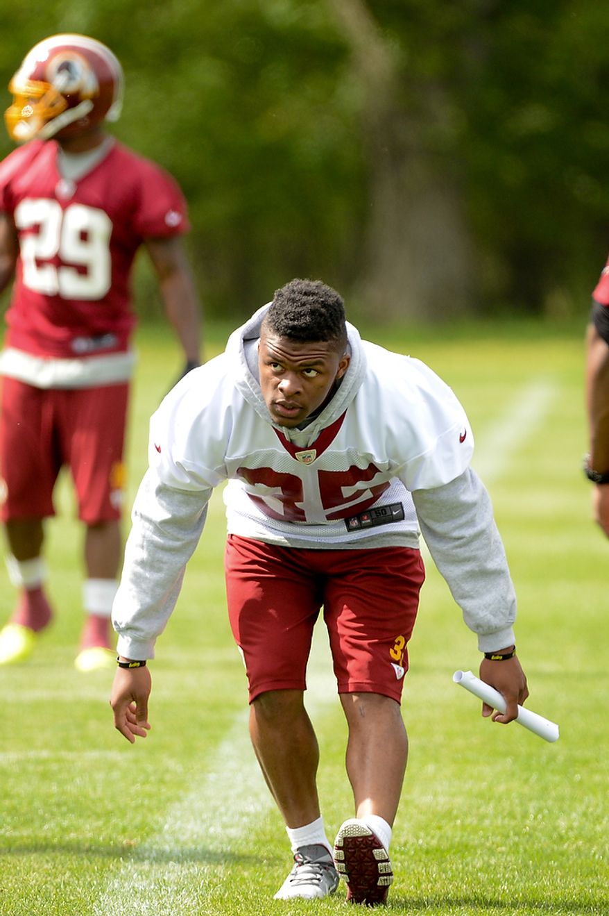 Newly drafted Washington Redskins running back Chris Thompson (35) warms up at the team's rookie minicamp at Redskins Park in Ashburn, Va., on Sunday, May 5, 2013. (Andrew Harnik/The Washington Times)