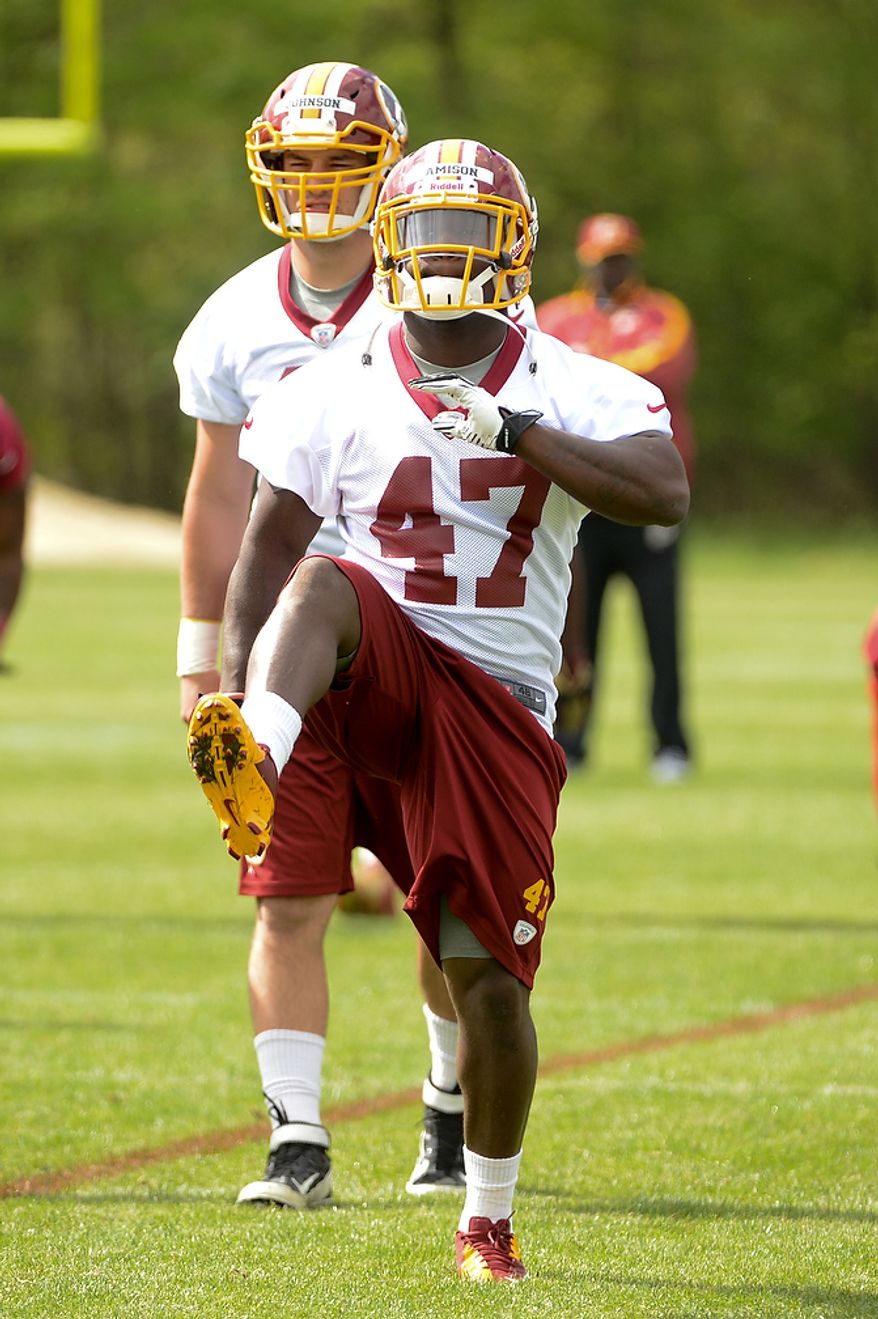 Newly drafted Washington Redskins running back Jawan Jamison (47) warms up at the team's rookie minicamp at Redskins Park in Ashburn, Va., on Sunday, May 5, 2013. (Andrew Harnik/The Washington Times)