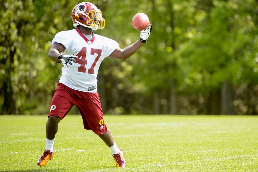 Newly drafted Washington Redskins running back Jawan Jamison (47) catches a pass at the team's rookie minicamp at Redskins Park in Ashburn, Va., on Sunday, May 5, 2013. (Andrew Harnik/The Washington Times)
