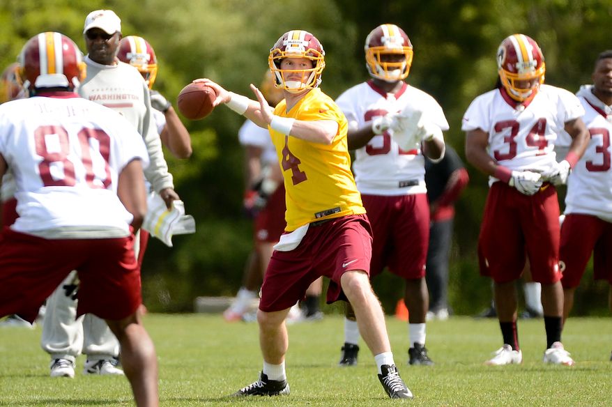 Quarterback Matthew McGloin (4) passes during a drill at the Washington Redskins' rookie minicamp at Redskins Park in Ashburn, Va., on Sunday, May 5, 2013. (Andrew Harnik/The Washington Times)