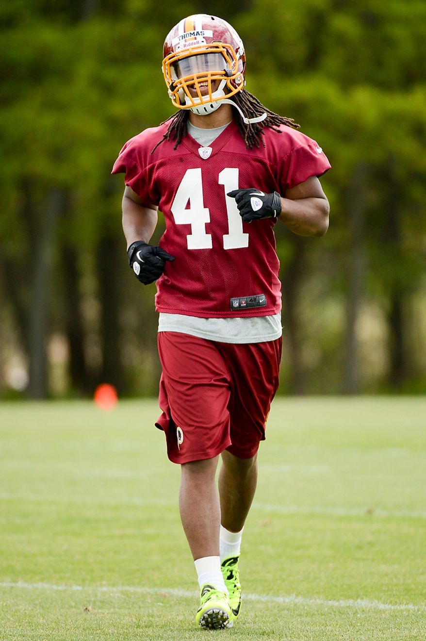 Newly drafted Washington Redskins safety Phillip Thomas (41) jogs to the sidelines during the team's rookie minicamp at Redskins Park in Ashburn, Va., on Sunday, May 5, 2013. (Andrew Harnik/The Washington Times)