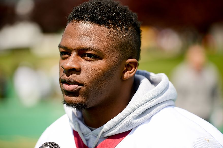 Newly drafted Washington Redskins running back Chris Thompson (35) talks to members of the media following rookie minicamp at Redskins Park in Ashburn, Va., on Sunday, May 5, 2013. (Andrew Harnik/The Washington Times)