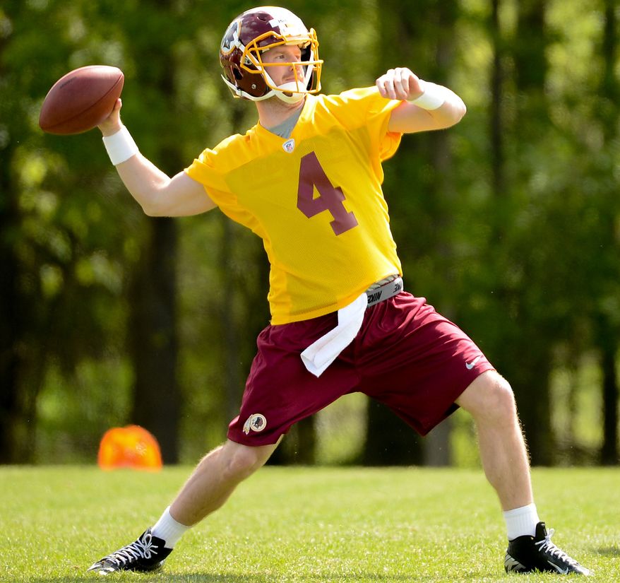 Quarterback Matthew McGloin (4) passes during a drill at the Washington Redskins' rookie minicamp at Redskins Park in Ashburn, Va., on Sunday, May 5, 2013. (Andrew Harnik/The Washington Times)