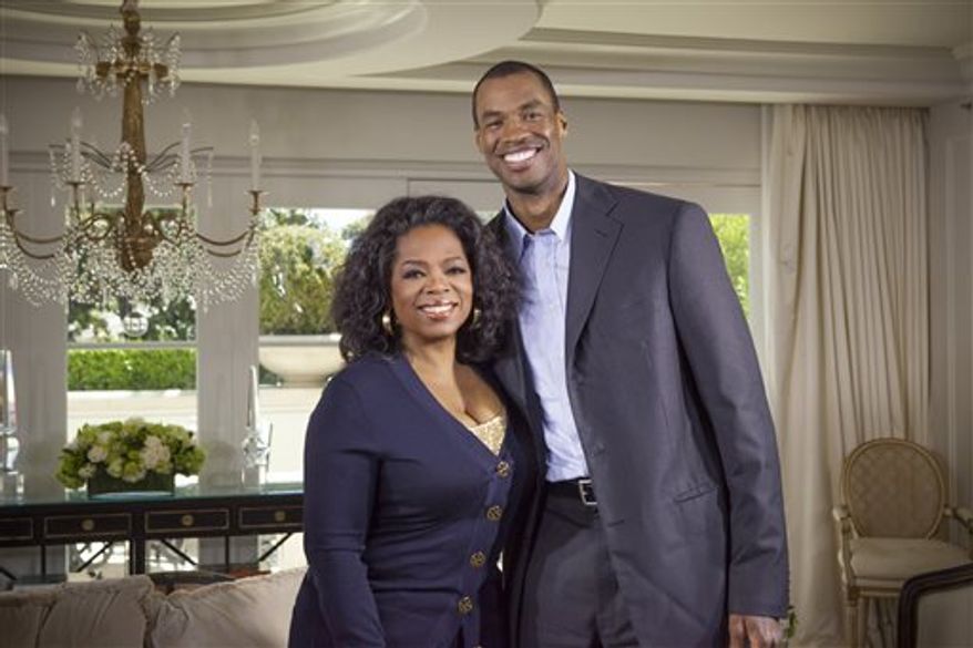 Oprah Winfrey with NBA basketball player Jason Collins during an interview for "Oprah's Next Chapter," in Beverly Hills, Calif. Officials at three publishing houses said Monday that they had been contacted about a planned memoir by Collins, the first active player in any of four major U.S. professional sports leagues to come out as gay. (AP Photo/OWN, Chuck Hodes)