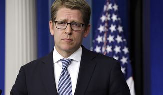 White House press secretary Jay Carney listens to a question from the media during his daily news briefing at the White House in Washington on Monday, May 6, 2013. (AP Photo/Jacquelyn Martin)