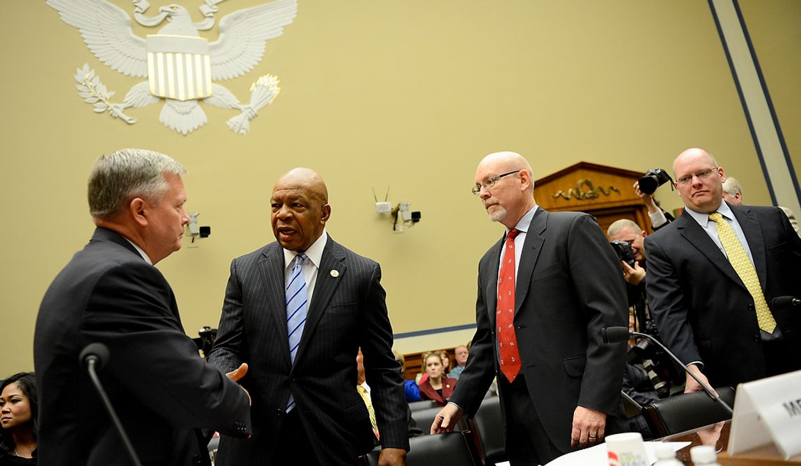 Vice Chairman Elijah Cummings (D-Md.), second from left, greets Acting Deputy Assistant Secretary for Counterterrorism Mark Thompson, left, before he  testifies before a House Oversight and Government Reform Committee hearing on the September 11, 2012 attack in Benghazi, Libya on Capitol Hill, Washington, D.C., Wednesday, May 8, 2013. Also pictured is Diplomatic Security Officer and former Regional Security Officer in Libya Eric Nordstrom, right, and former Deputy Chief of Mission/Charg&amp;#195;&amp;#710; d&amp;#195;&amp;#173;Affairs in Libya Gregory Hicks, second from right. (Andrew Harnik/The Washington Times)