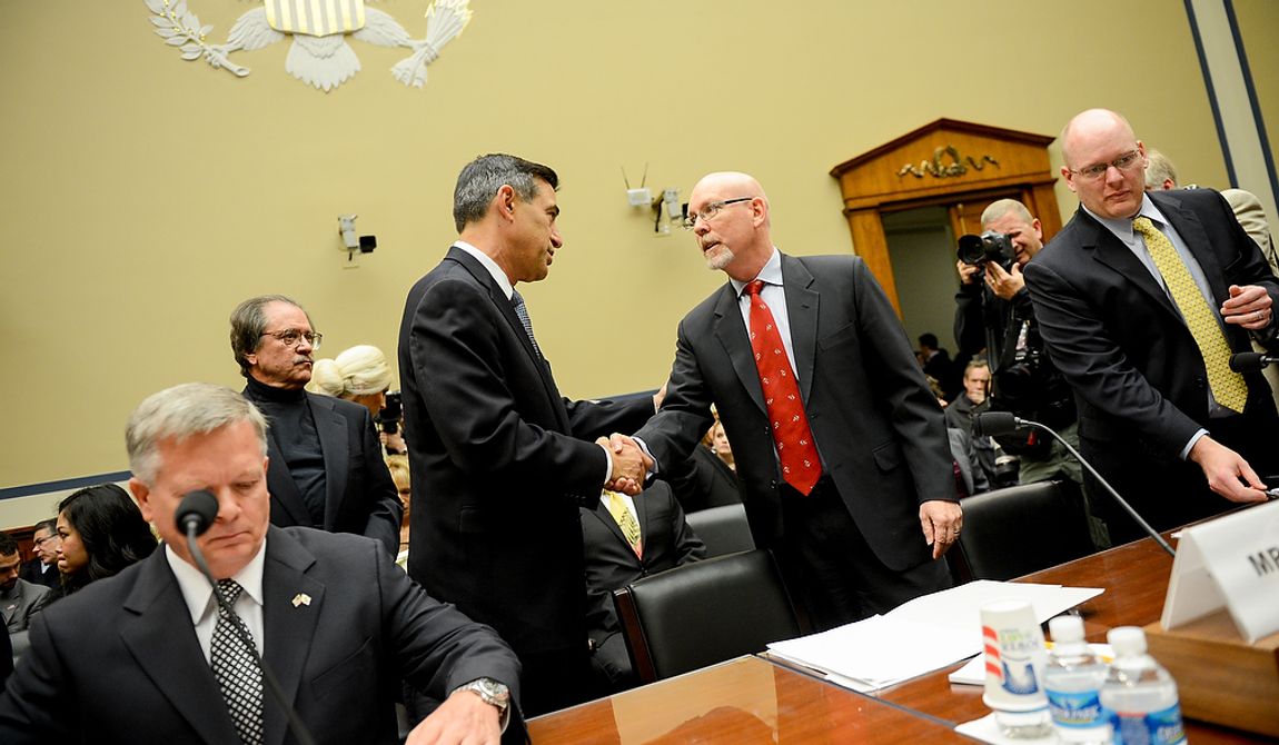 Chairman Darrell Issa (R-Calif.), second from left, greets Foreign Service Officer and former Deputy Chief of Mission/Charg&amp;#195;&amp;#710; d&amp;#195;&amp;#173;Affairs in Libya Gregory Hicks before he  testifies before a House Oversight and Government Reform Committee hearing on the September 11, 2012 attack in Benghazi, Libya on Capitol Hill, Washington, D.C., Wednesday, May 8, 2013. Also pictured is State Department officials Acting Deputy Assistant Secretary for Counterterrorism Mark Thompson, left, and Diplomatic Security Officer and former Regional Security Officer in Libya Eric Nordstrom, right. (Andrew Harnik/The Washington Times)