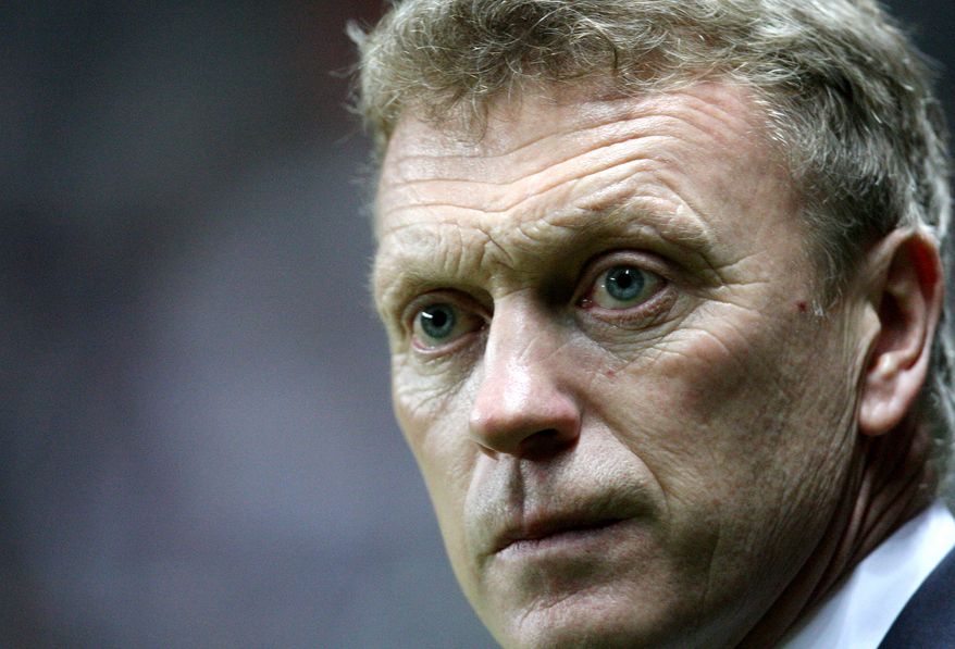FILE - This is a Wednesday, Jan. 2, 2013 file photo of Everton's manager David Moyes as he looks on ahead of their English Premier League soccer match against Newcastle United at St James' Park, Newcastle, England. Everton manager David Moyes and Real Madrid coach Jose Mourinho are the two clear favorites, to succeed Alex Ferguson who will retire as Manchester United's manager at the end of the current season . The announcement of Ferguson's retirement was made on Wednesday May 8, 2013. (AP Photo/Scott Heppell, File)