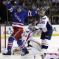 New York Rangers right wing Ryane Clowe (29) celebrates a goal scored by left wing Carl Hagelin in the second period of Game 4 of their first-round NHL hockey Stanley Cup playoff series against the Washington Capitals in New York, Wednesday, May 8, 2013. (AP Photo/Kathy Willens)
