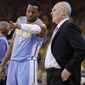 Denver Nuggets guard Andre Iguodala (9) talks with head coach George Karl during the first half of Game 4 in a first-round NBA basketball playoff series against the Golden State Warriors, Sunday, April 28, 2013, in Oakland, Calif. (AP Photo/Ben Margot)