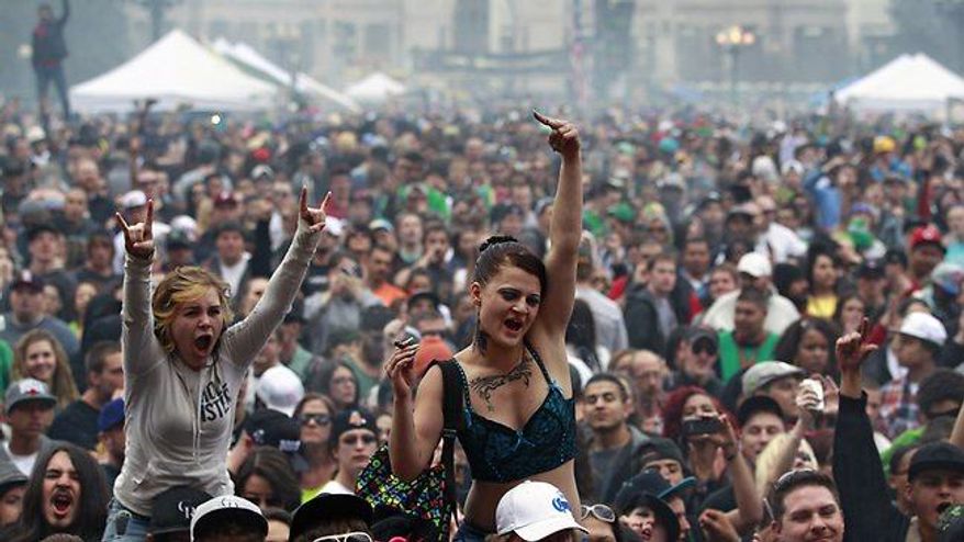 Thousands enjoy a marijuana celebration in Denver, Colo. on April 20, 2013. (Associated Press)