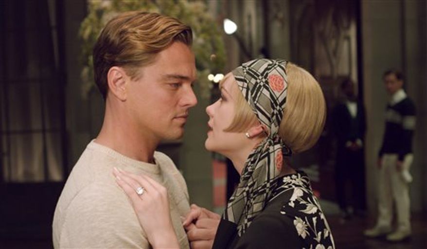 Leonardo DiCaprio as Jay Gatsby and Carey Mulligan as Daisy Buchanan are pictured in a scene from "The Great Gatsby." (AP Photo/Warner Bros. Pictures)