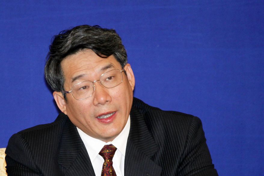 ** FILE ** In this April 29, 2009, file photo, Liu Tienan, then the vice chairman of the National Development and Reform Commission, speaks during a press conference in Shanghai. China's top anti-graft committee is investigating the deputy chairman of the country's economic planning agency, the latest high-level official to be ensnared by the new leadership's anti-corruption drive. (AP Photo/Eugene Hoshiko, File)