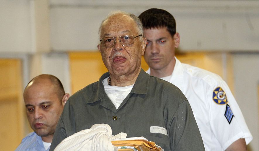 A movie is being planned about abortionist Kermit Gosnell, shown here being escorted to police custody after his May 2013 murder convictions for killing newborn babies. The movie producers are seeking additional funds through Indiegogo. (Associated Press/Philadelphia Daily News)