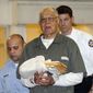 A movie is being planned about abortionist Kermit Gosnell, shown here being escorted to police custody after his May 2013 murder convictions for killing newborn babies. The movie producers are seeking additional funds through Indiegogo. (Associated Press/Philadelphia Daily News)