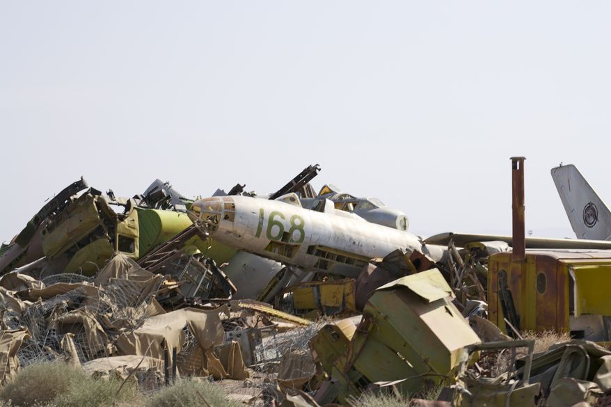 Known as the "Shindand boneyard," scraps of Soviet aircraft from the 1980s litter the landscape at Shindand Air Base, an Afghan military base in the westernmost province of Herat. (Kristina Wong/The Washington Times)