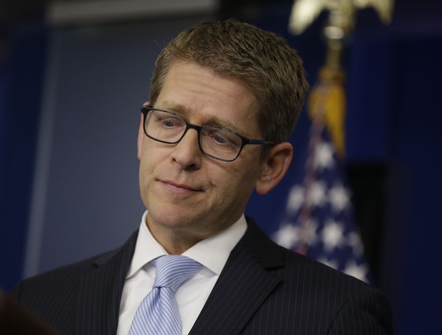 White House spokesman Jay Carney takes questions during his daily news briefing at the White House in Washington on May, 14, 2013. Carney touched on various topics including the Justice Department's secretly obtaining two months of telephone records of reporters and editors for the Associated Press and IRS. (Associated Press)