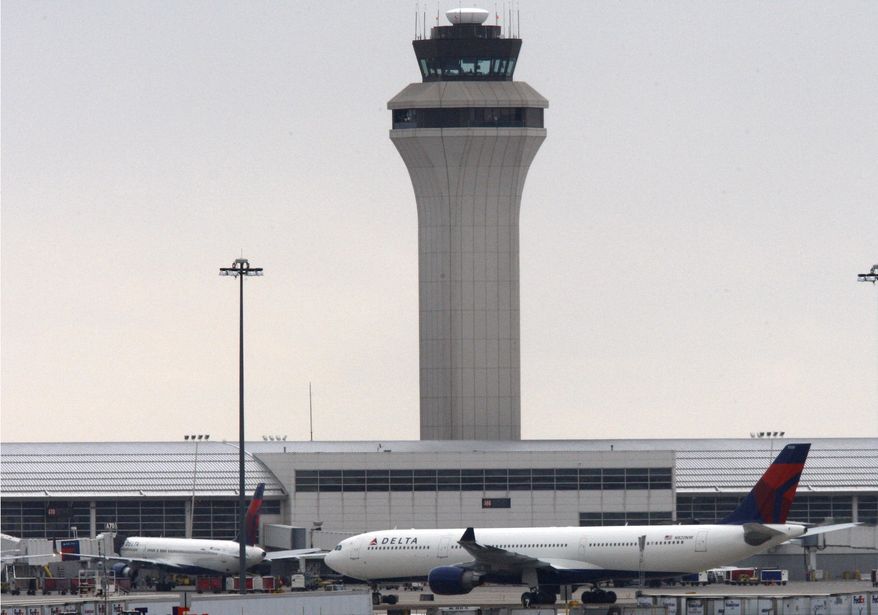 ** FILE ** Jets sit on the apron at Detroit Metropolitan Wayne County Airport in Romulus, Mich., on Dec. 26, 2009. (AP Photo/Carlos Osorio)