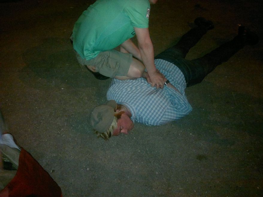 In this handout photo provided by the FSB, acronym for Russian Federal Security Service, a man claimed by FSB to be Ryan Fogle, a third secretary at the U.S. Embassy in Moscow, is detained in Moscow, early Tuesday, May 14, 2013. Russia's security services say they have caught a U.S. diplomat who they claim is a CIA agent in a red-handed attempt to recruit a Russian agent. (AP Photo/FSB Public Relations Center)