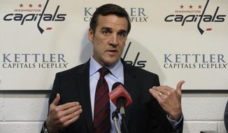 Washington Capitals general manager George McPhee talks with reporters at the Kettler Iceplex in Arlington, Va., Wednesday, May 15, 2013. The Capitals were eliminated in the first round of the NHL Stanley Cup playoffs by the New York Rangers. The Capitals have had six consecutive playoff appearances and have failed to get past the second round. (AP Photo/Susan Walsh)