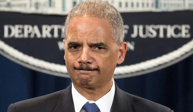 ** FILE ** Attorney General Eric Holder is questioned about the Justice Department secretly obtaining two months of telephone records of reporters and editors for The Associated Press, during a news conference at the Justice Department in Washington, Tuesday, May 14, 2013. (AP Photo/J. Scott Applewhite)

